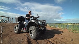 Driving on a rural farm dirt road POV. Summer recreation and sport riding an all terrain vehicle on farm or ranch dirt road. Sport Utility Vehicle side by side UTV. Four wheel drive fun excitement.
