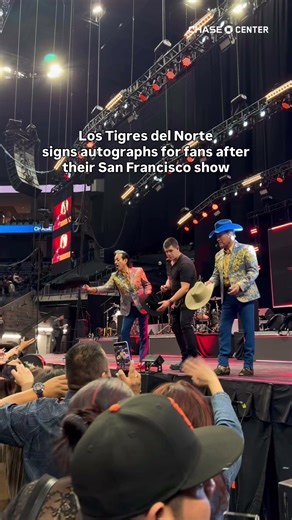 Los Tigres del Norte signs autographs for fans after their San Francisco show