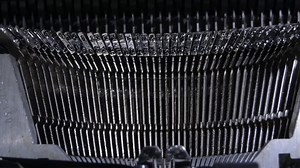 Keys hitting while typing in an old qwerty typewriter