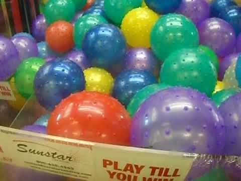 Spiky ball claw machine wins