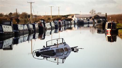 Old sunken boat hauled back to shore