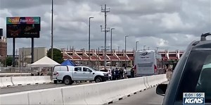 Authorities transfer inmate through international bridge