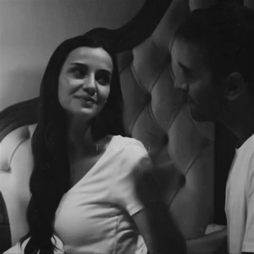 Couple's Intimate Moments in Bedroom Setting