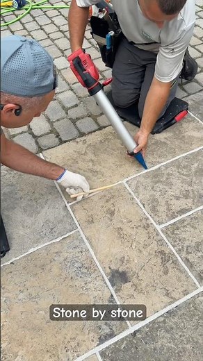 Stone by stone getting caulked! #caulking #diy