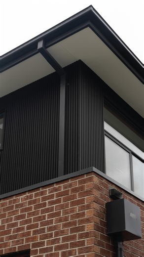 Tired of seeing plain render? Add bold texture with our CLADDING range and create an exterior that stops people in their tracks. Black CLADDING showing off in it's new location! 🔥 #composite #cladding #exterior #exteriordesign #homeideas | WoodEvo