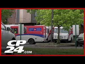 Striking Canada Post workers back on the picket lines ahead of a demonstration