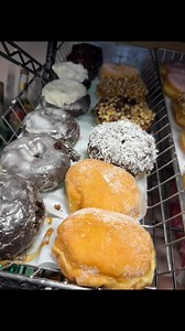 6.8K views · 74 reactions | A glimpse at today’s classic donut selection: triple blueberry; chocolate coconut; maple walnut; and cookie butter just to name a few! | The Donut Factory | Facebook