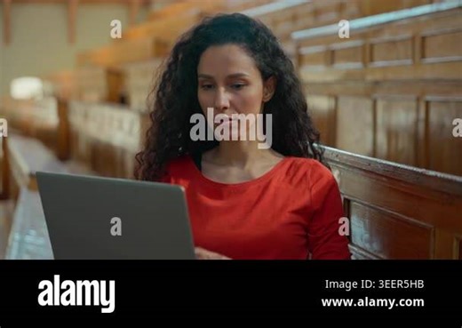 Portrait serious Hispanic Latina student girl using laptop university classroom woman Caucasian female lady online studying internet learning computer e-learning college academy prepare exams homework Stock Video Footage - Alamy