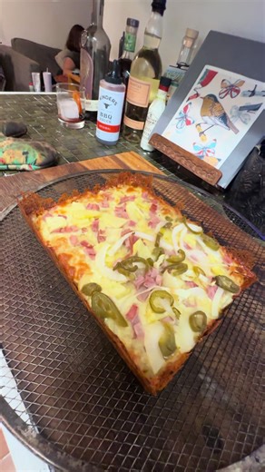 Got some really big cheese edges on er... Detroit style Hawaiian pizza.