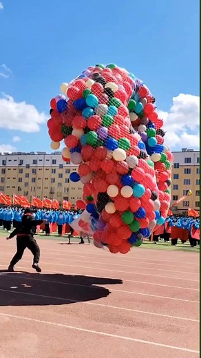Community Balloon Release Event Under Clear Blue Sky