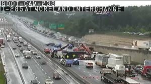 I-85 South ramp to I-285 West shut down after tractor trailer overturns, causing major backup