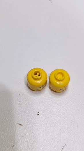 The Evolution of LEGO Minifig Heads: From Holes to Solid Tops