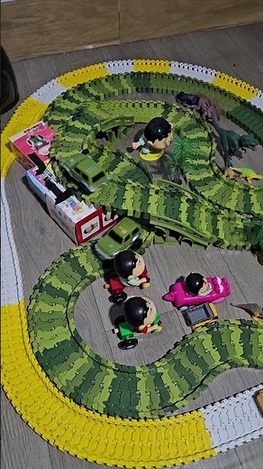 Playing toy car racing arena