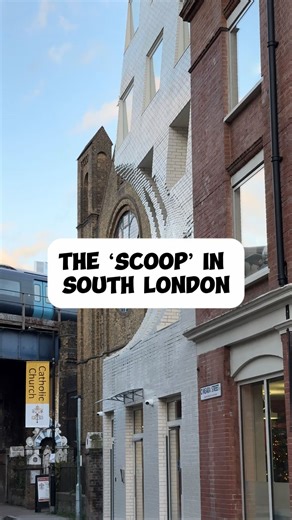 In South London, not far from Borough Market, you can find ‘The Scoop’! At 50-52 Union Street is an office block development. Completed in 2024, it was started by Lipton Plant Architects and finished by Corstorphine and Wright. It has a specially designed cut-out from the building to highlight the rose window of the Victorian church behind. A traditional development would have completely blocked the view of the church from multiple angles, but this design was put in place with the aim to protect