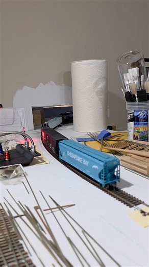 Our journey begins! The last train that I ran, during the operating session, was a small local freight. Here it is leaving the large staging area. Staging is two levels on this layout, top and bottom. The top level heads out onto the main line, through this hole in the wall. It is also worth noting that quite a large number of the switches on this layout are hand built! That just boggles my mind! From Rich Lull's Richmond Terminal Railway, HO scale | Reading and Lehigh Railroad, N scale