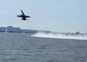 Blue Angels Kick Up Water on Low Pass
