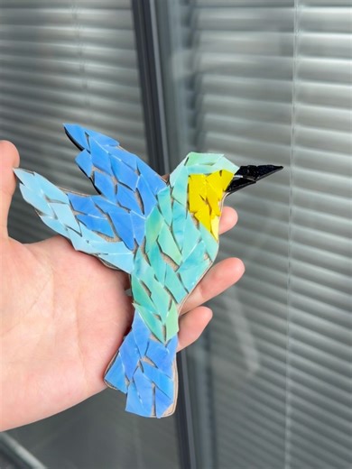 Grout said: ‘I’m about to pull this whole project together.##mosaickit #mosaictiles #DIYKits #GlassMosaic #DIYDecor #grouting #mosaic #mosaicchallenge #birdlover #hummingbird