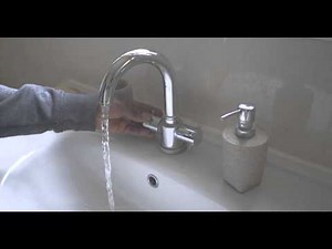A bathroom tap running water - Free Stock Video Footage