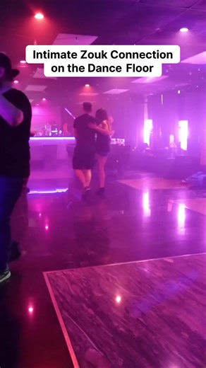 Pure magic under the neon glow! 🤩 Witnessing this embodied connection in Brazilian Zouk is mesmerizing. Watch the seamless flow and intimate rhythm shared between these partners as they navigate the vibrant purple and pink lights of the dance floor. That close embrace and effortless movement truly define the electric atmosphere captured at the WildZouk Social in Miami. A masterclass in non-verbal communication unfolding right before your eyes. #Zouk #BrazilianZouk #DanceConnection #MiamiNights 