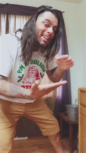 Festive Dance Moves: Man Grooves to Christmas Music in 'Santa Body' Tee#ChristmasDance