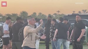 The Weeknd covers up while enjoying Coachella with his girlfriend Simi Khadra