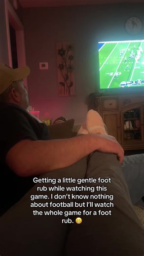 Enjoying the Game with a Foot Rub