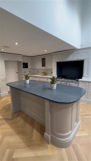 Stunning Kitchen completed with bespoke mantel, quartz worktops,tiled splashbacks & LED lighting. @Howdens