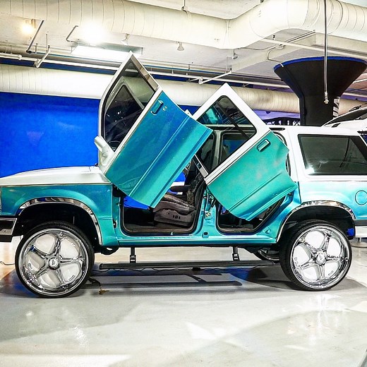 2.9M views · 10K reactions | Post Malone's Custom Ford Explorer with butterfly doors!  #postmalone #cars #trucks | Kali Muscle | Facebook
