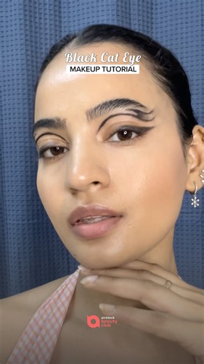 Black Cat Eye Makeup Tutorial | Sharp, Bold & Fierce 🖤✨ Want that snatched, dramatic eye look? This black cat eye is perfect for glam nights and bold statements! Products Used • Black eyeshadow • Black gel/liquid eyeliner • Small angled brush • Mascara / Lashes Step-by-Step Process 1️⃣ Apply a neutral base shade on the lids 2️⃣ Deepen the outer corner with black eyeshadow 3️⃣ Draw a sharp winged liner extending outward 4️⃣ Connect the liner to the lash line for a sleek cat shape 5️⃣ Finish with