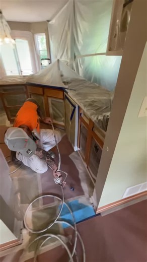 Spraying kitchen cabinets with a fast-dry oil primer using a 515 tip. This step is all about adhesion, blocking tannins, and setting the cabinets up for a smooth, durable finish. Proper prep and the right products make all the difference. www.trucoatpaintingplus.com | Trucoat Painting Plus