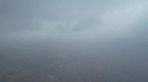 Download Fast Moving Rain Clouds over British Town, Time Lapse Footage for free