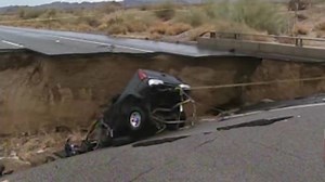 Floodwaters cause bridge to collapse on I-10