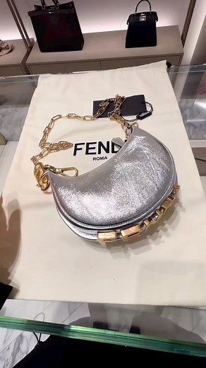 The silver Nano Fendigraphy bag with oversized gold logo detail is is spluge at $1,350. Hot! Or Hmm…? * #fashionbombdaily #bombaccessories #fendi 📸 @_onyxia Blogged by @limo_x | Fashion Bomb Daily