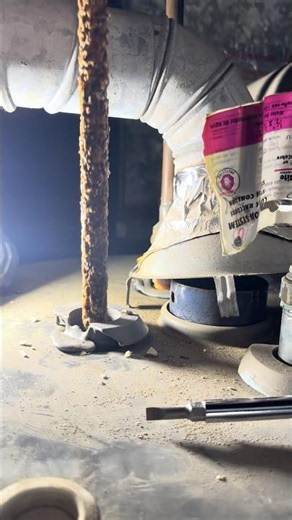 Replacing rusty anode rode for water heater maintenance 08/22/26.
