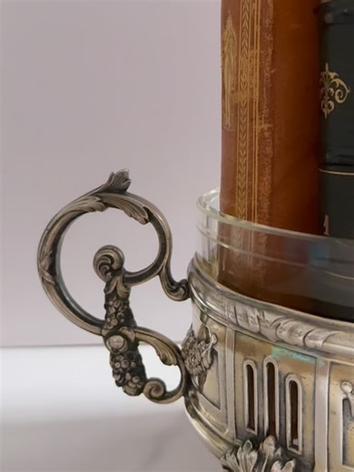 Alexis | Antiques and Vintage Finds on Instagram: "✨Available✨ French Louis XVI–style silver-plated centerpiece. An elegant 19th century Neoclassical bowl with ribbon cartouche, garland swags, fluted detailing, and graceful handles. Silver plate over brass with a warm, time-worn patina, complete with glass insert in excellent condition. Perfect styled with books or as a sculptural accent on a table or sideboard. Measures 13 7/8” handle to handle, 6 1/2” wide, and 5” tall. The insert is 10 1/2” l