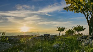 Download Sunrise with Mountains, Trees and Clouds for free