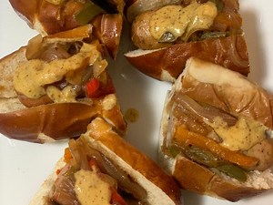 Skillet Brats with Beer Caramelized Peppers and Onions