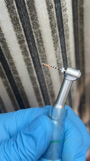 This tiny piece of gutta percha took me 10 minutes to removing ultrasonics and retreatment files did the job