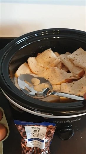 slow cooker bread and butter pudding #fyp #Recipe #slowcooker #slowcookerrecipe #Recipe #recipesoftiktok #breadandbutterpudding #pudding #desertideas #desert ingredients below bread butter whole milk cinnamon nutmeg chocolate powder vanilla extract eggs super chocolate chips high for 2 to 3 hours serve with ice cream or custard enjoy! | Dadthefoodie