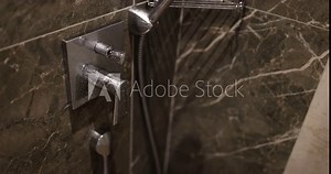 Shower mixer designed for temperature and pressure control. Shower mixer blends hot and cold water providing comfortable shower experience
