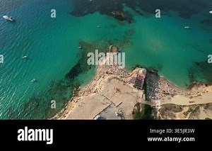 Aerial images of Cala Conta beach, on the island of Ibiza during a sunny summer day, Cala Comte, 4k 30fps Stock Video Footage - Alamy