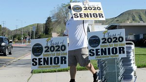 Watch as Newbury Park High School seniors receive graduation yard signs, decals