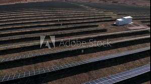 Aerial top down view of Solar energy modules or panels rows. Solar Panels, Alternative energy, Solar Farms. Industrial Energy Farm producing concentrated solar power. Photovoltaic Plant. PV