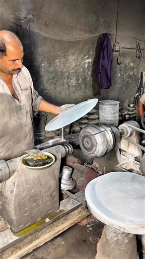 11K views · 65 reactions | Witness the traditional aluminium pot making process, where a skilled craftsman transforms a round aluminium sheet into a shiny cooking pot using a vintage spinning machine and hand tools. A true display of old-school craftsmanship and precision! #AluminiumPot #MetalSpinning #TraditionalCraft #VintageLathe #HandmadeProcess #MetalWork #Craftsmanship #OldMachine #CookwareMaking #Reels | Creators Craft | Facebook