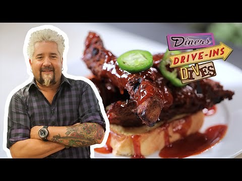 Guy Fieri Eats BBQ Smoked Alligator Ribs | Diners, Drive-Ins and Dives | Food Network