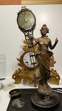 swinging arm mystery clock pendulum in action - Junghans