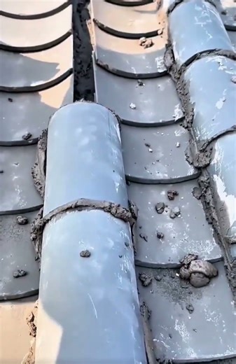 Apply the cement mixture, then install the corrugated roof, which is more practical than a standard