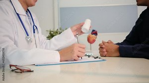 Explore a medical consultation with a doctor holding a pill bottle, educating a patient. The doctor issues a medical prescription. The patient, an Afro-American, faces health challenges. Emphasizes he