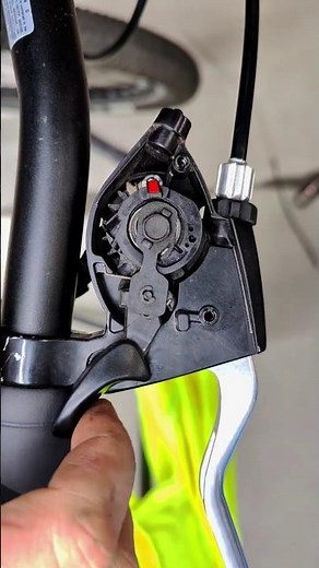 How does a bicycle gear shifter work