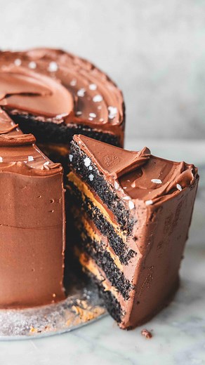 Sweet and salty chocolate layer cake with whipped salted caramel. Recipe in this weeks newsletter for subscribers, linked in my bio #chocolatecake #saltedcaramel #layercake #chocolatecakerecipe #ganache #blackcocoa #birthdaycake | The Boy Who Bakes